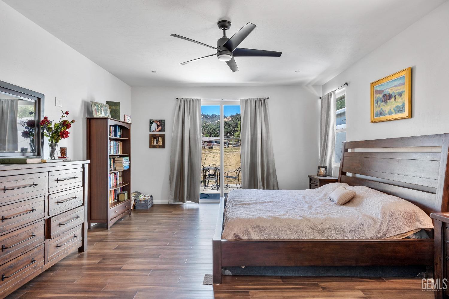Undisclosed Address Tehachapi, CA 93561 - Photo 26 of 41 a bedroom with a bed and a dresser