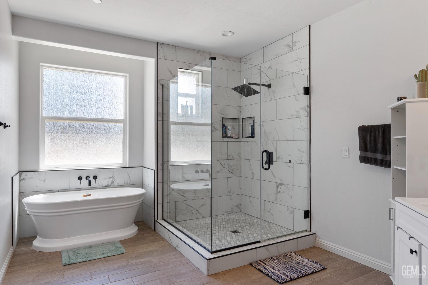 Undisclosed Address Tehachapi, CA 93561 - Photo 29 of 41 a bathroom with a bathtub shower sink mirror and toilet