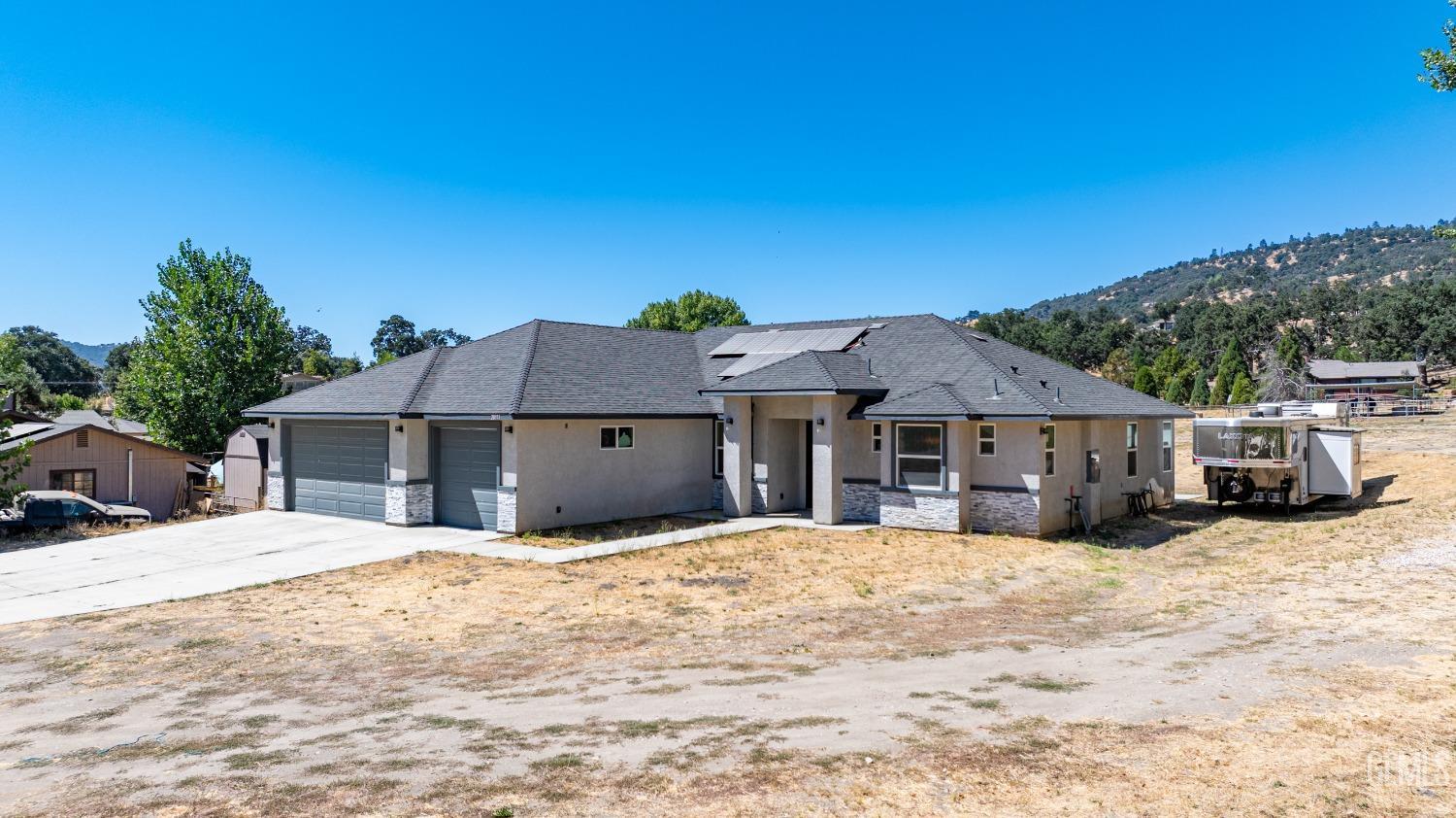 Undisclosed Address Tehachapi, CA 93561 - Photo 31 of 41 a view of a house with a yard