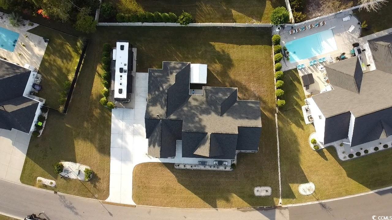 646 Pacific Commons Drive Surfside Beach, SC 29575 - Photo 36 of 40 Aerial view of a pool area