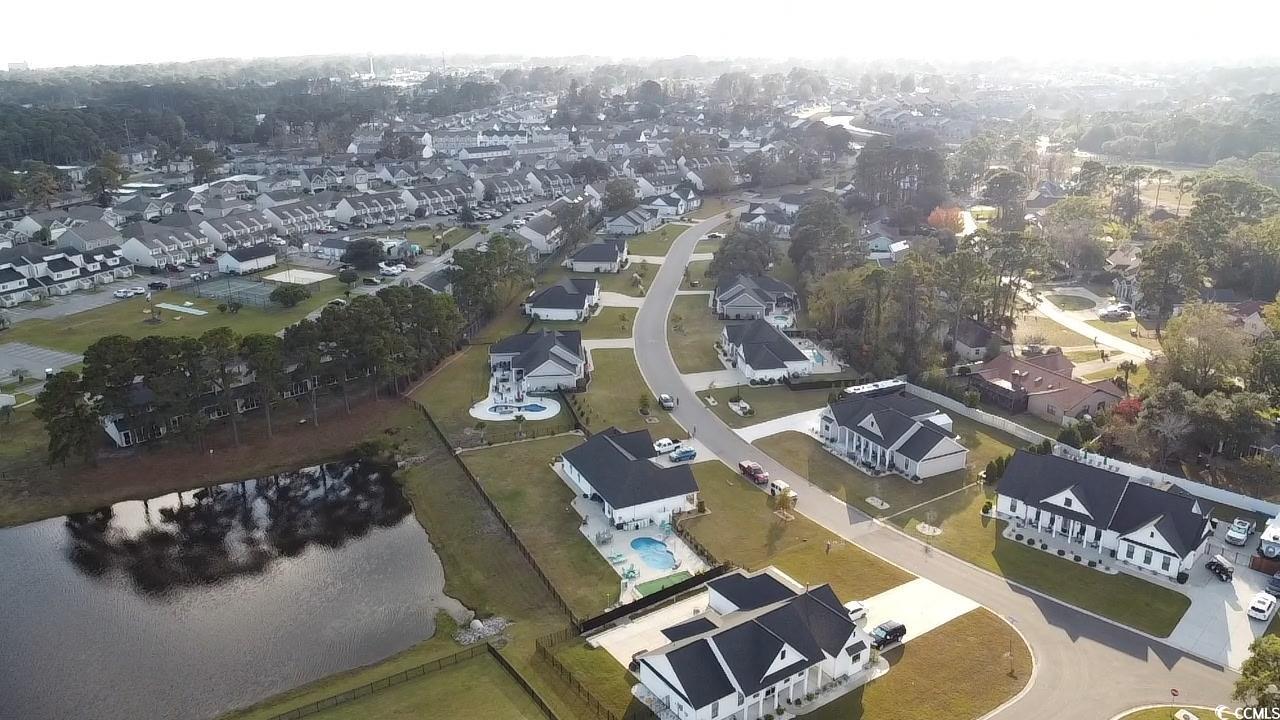 646 Pacific Commons Drive Surfside Beach, SC 29575 - Photo 40 of 40 Aerial view of property and surrounding area featuring nearby suburban area