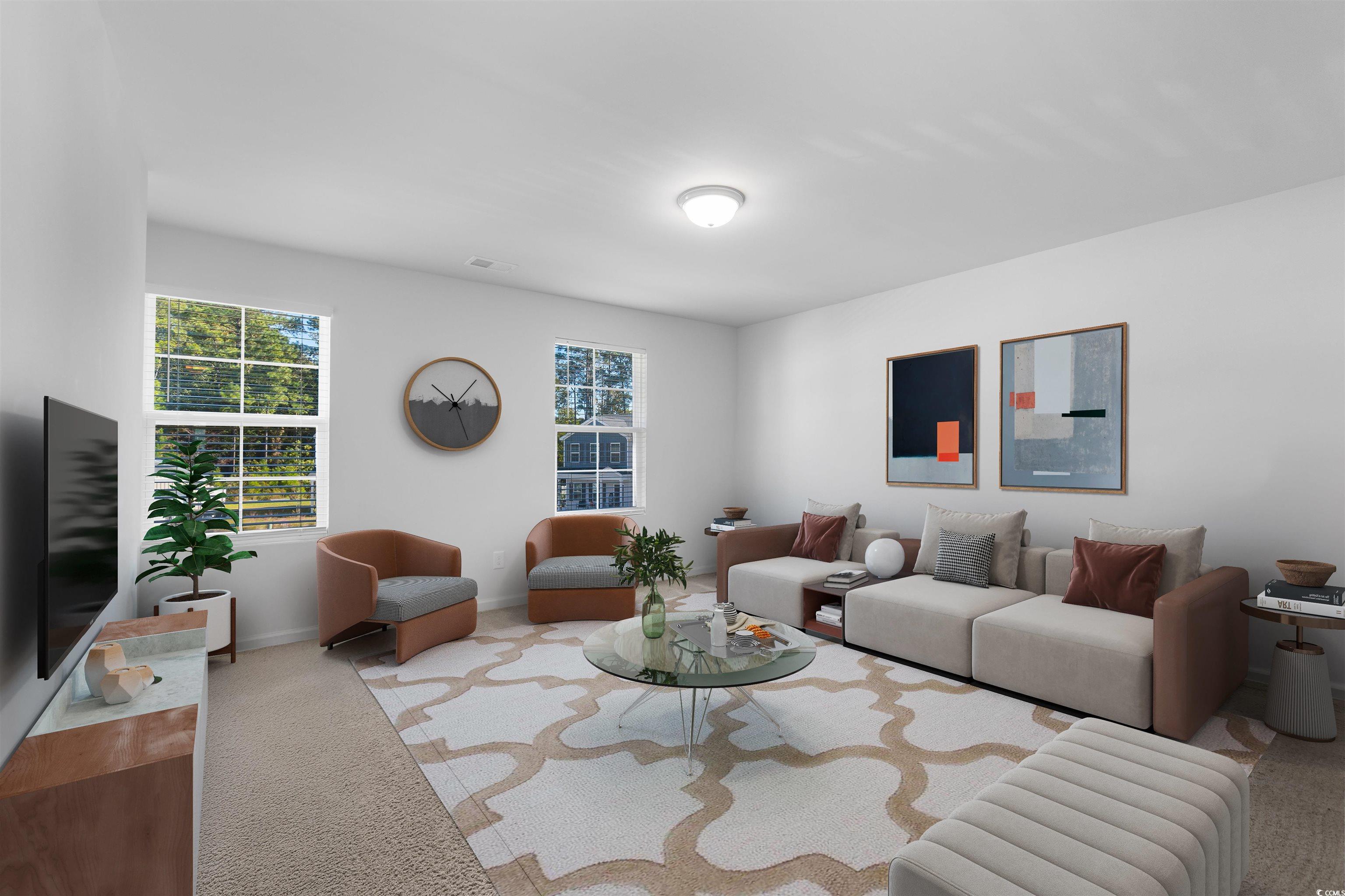 430 Stevia Court Conway, SC 29526 - Photo 16 of 40 Living area featuring carpet floors and plenty of natural light