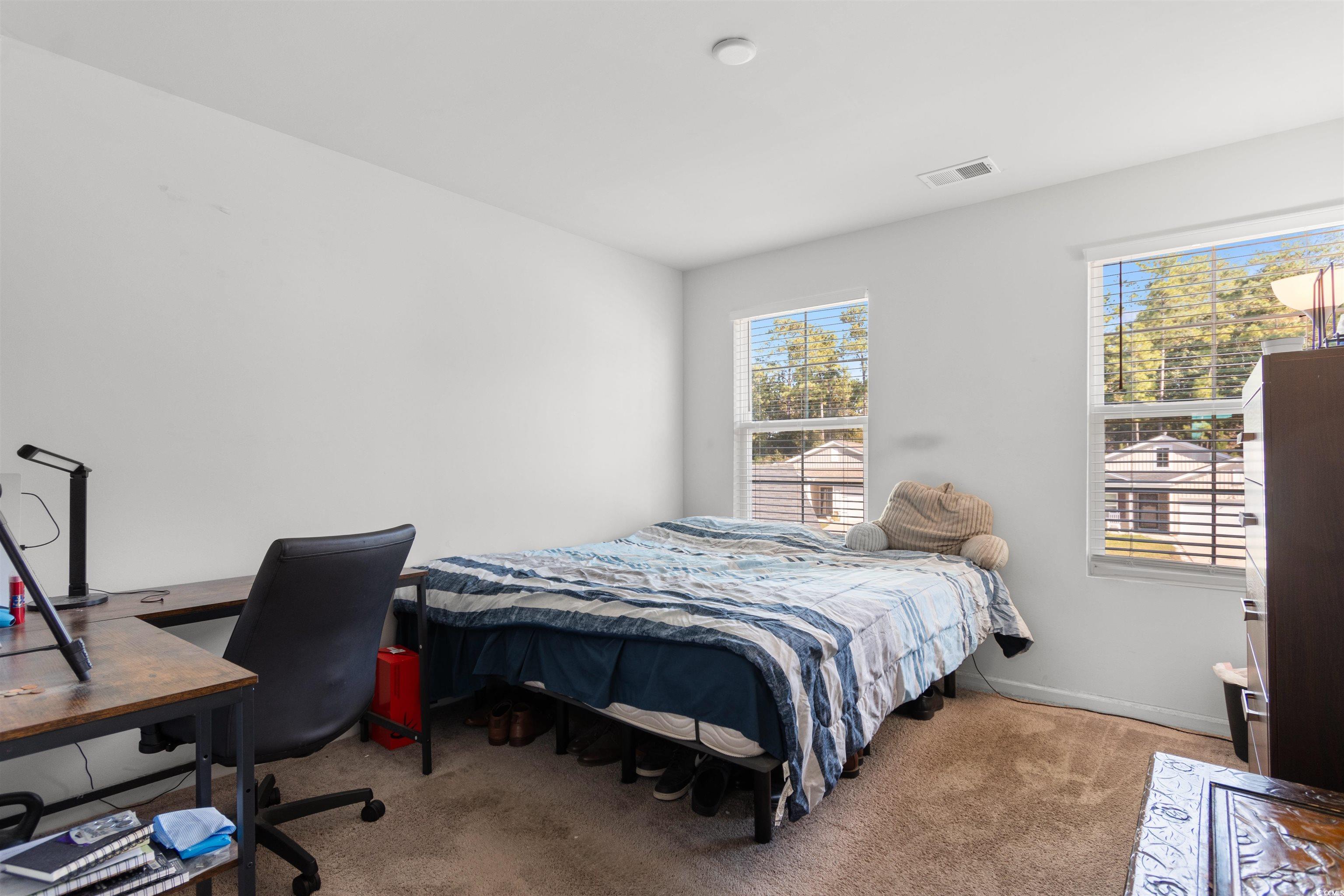 430 Stevia Court Conway, SC 29526 - Photo 25 of 40 Bedroom featuring light carpet and a desk
