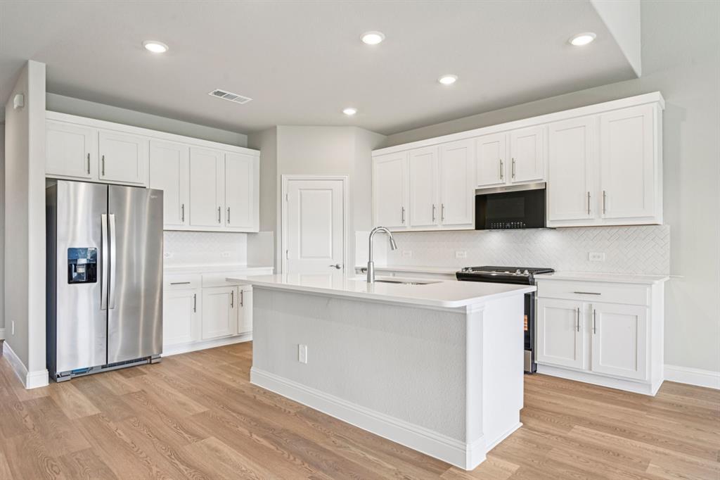 2629 Grand Cyn Street Anna, TX 75409 - Photo 2 of 40 Photo is not of the actual home, but is an inspirational photo of builder’s model home and may depict options, furnishings, and/or decorator features that are not included.