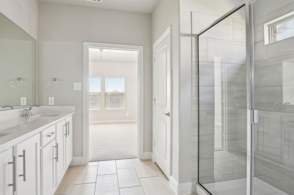 2629 Grand Cyn Street Anna, TX 75409 - Photo 24 of 40 Photo is not of the actual home, but is an inspirational photo of builder’s model home and may depict options, furnishings, and/or decorator features that are not included.