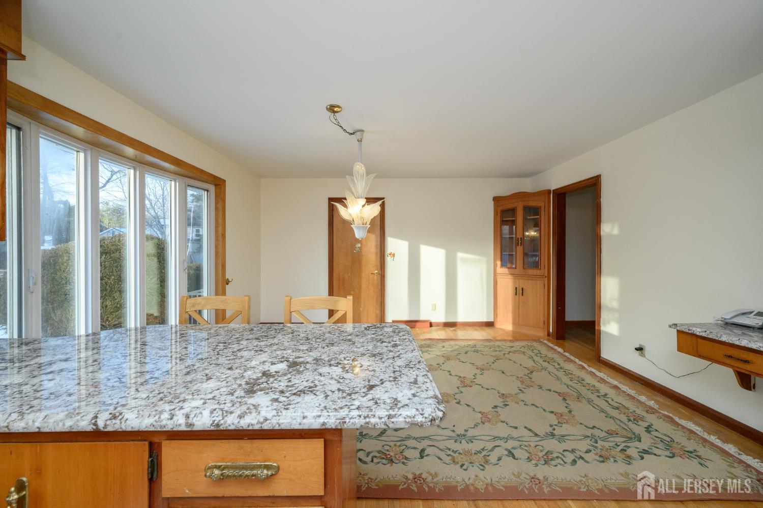 1821 Englishtown Road Old Bridge, NJ 08857 - Photo 17 of 46 a large bathroom with a granite countertop sink and a large mirror