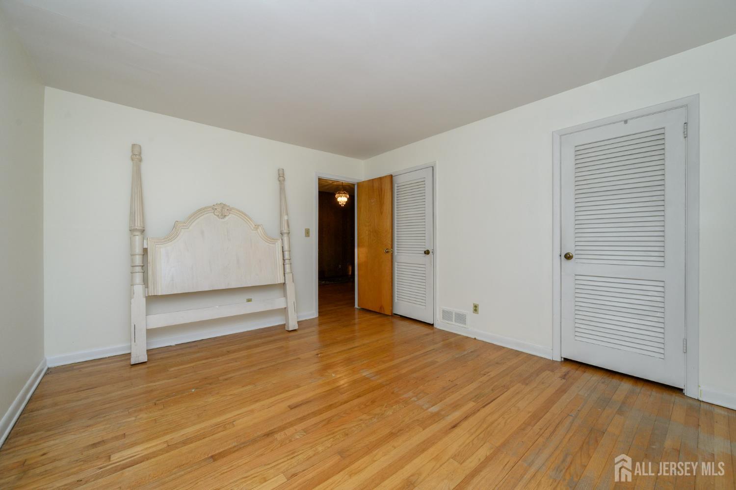 1821 Englishtown Road Old Bridge, NJ 08857 - Photo 28 of 46 a view of empty room with wooden floor