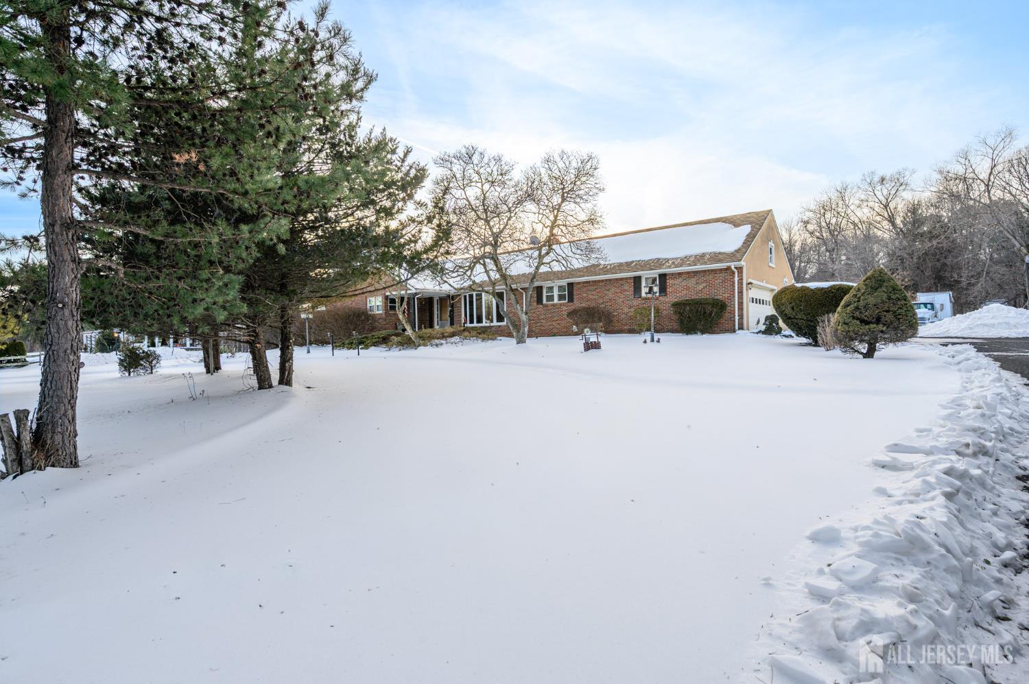 1821 Englishtown Road Old Bridge, NJ 08857 - Photo 38 of 46 a street view covered with snow