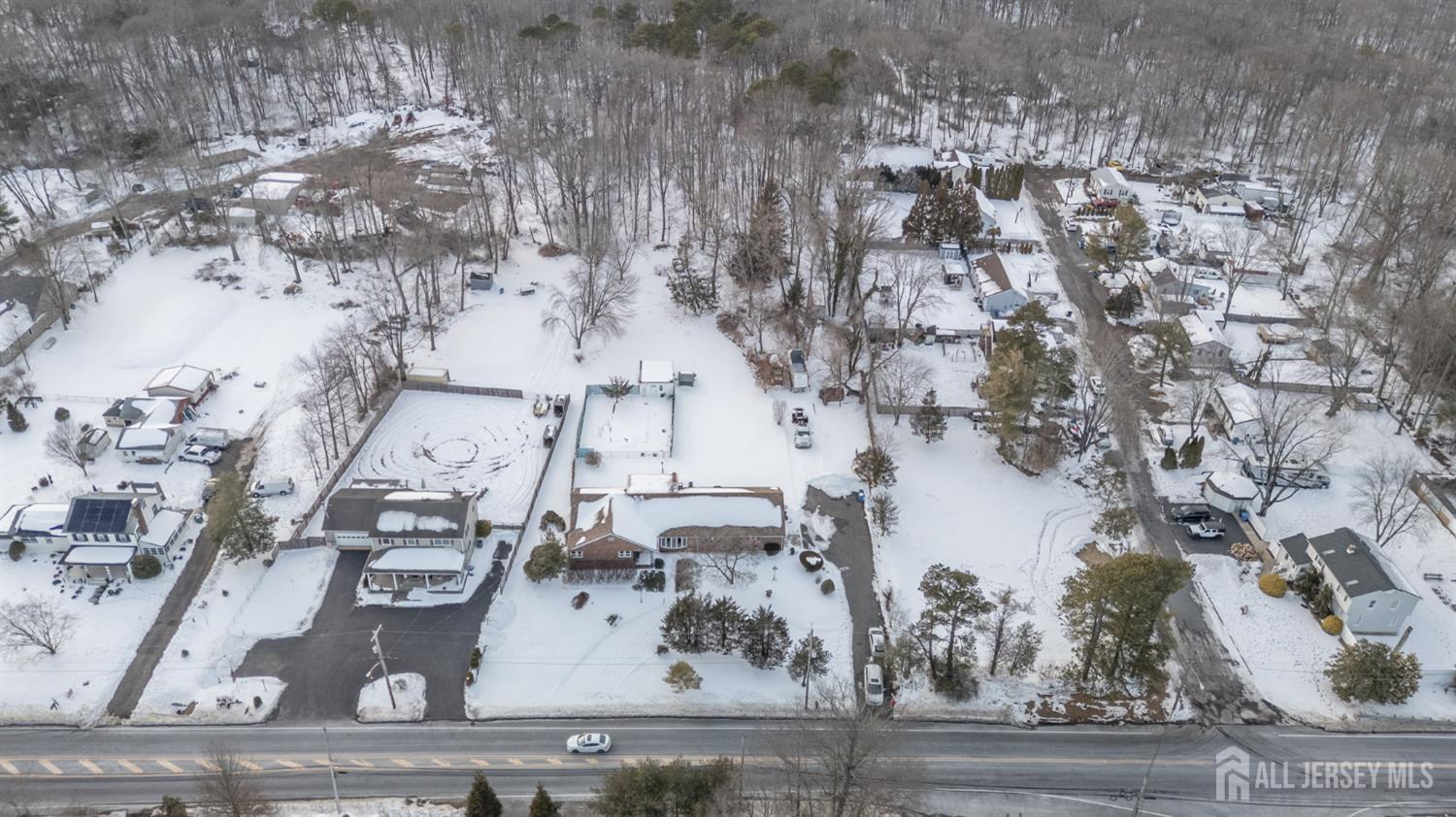1821 Englishtown Road Old Bridge, NJ 08857 - Photo 39 of 46 a view of residential house with car parked