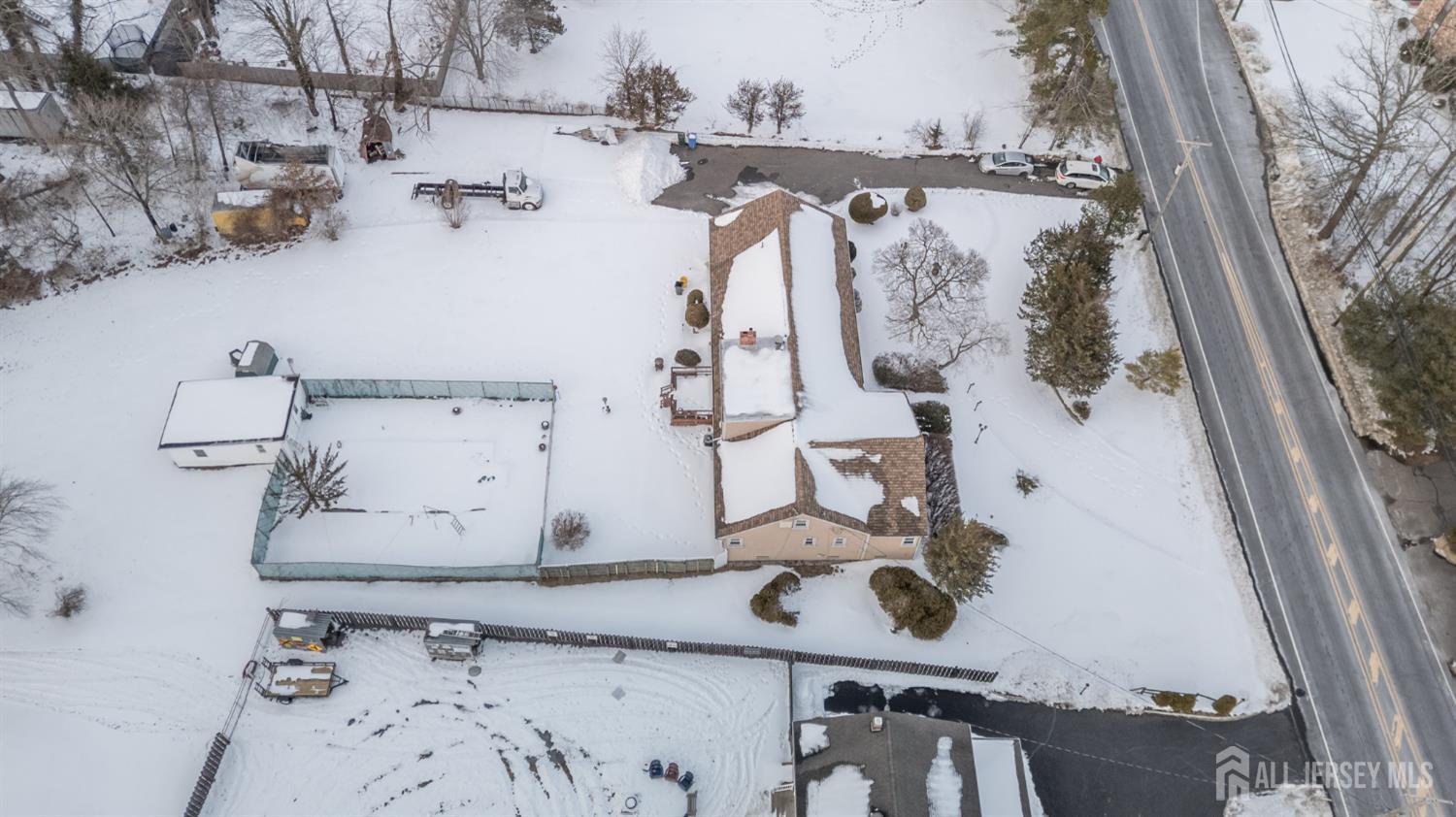 1821 Englishtown Road Old Bridge, NJ 08857 - Photo 41 of 46 a bathroom with a sink and mirror with bathtub