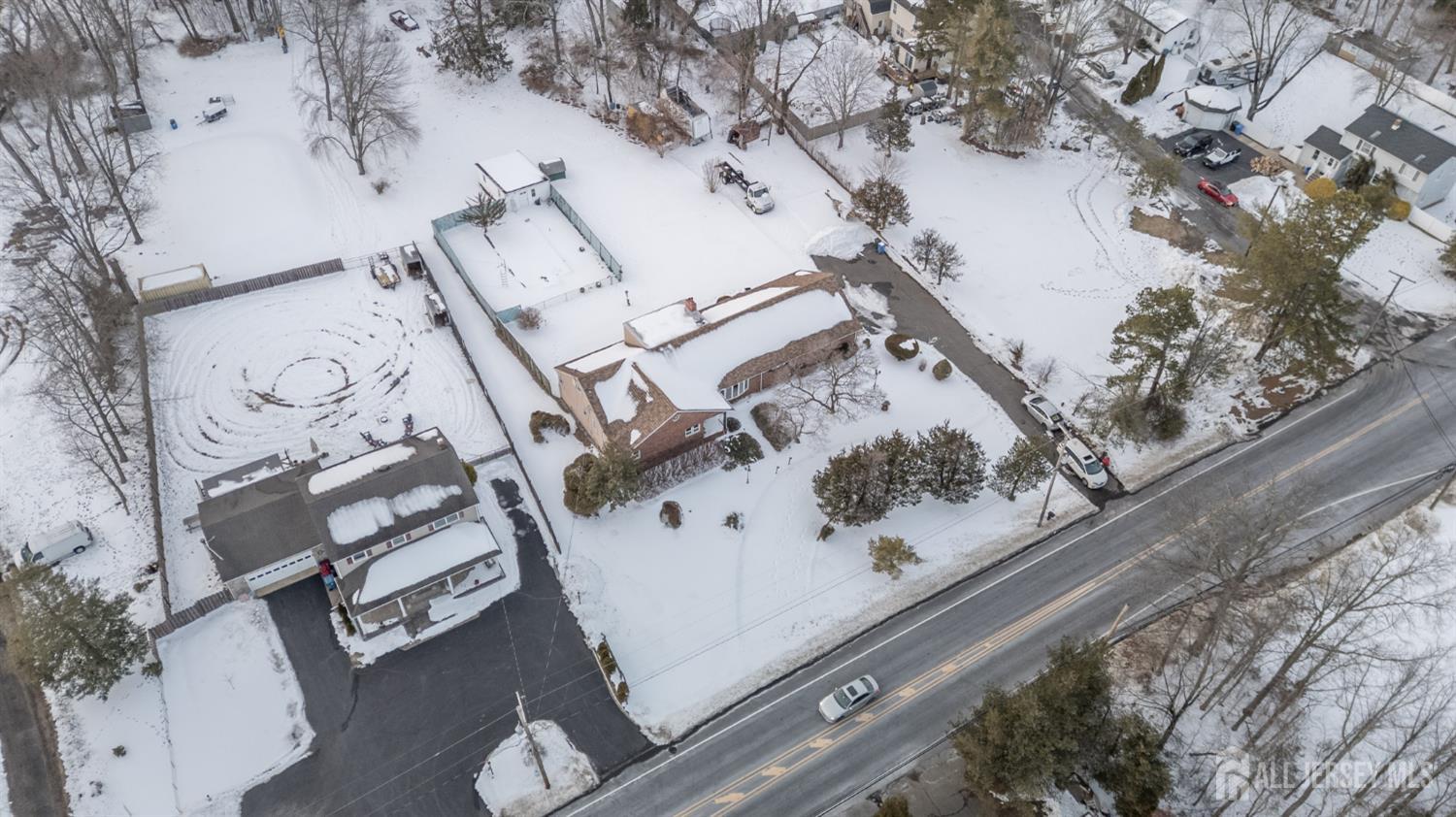 1821 Englishtown Road Old Bridge, NJ 08857 - Photo 42 of 46 a white house with trees in front of it
