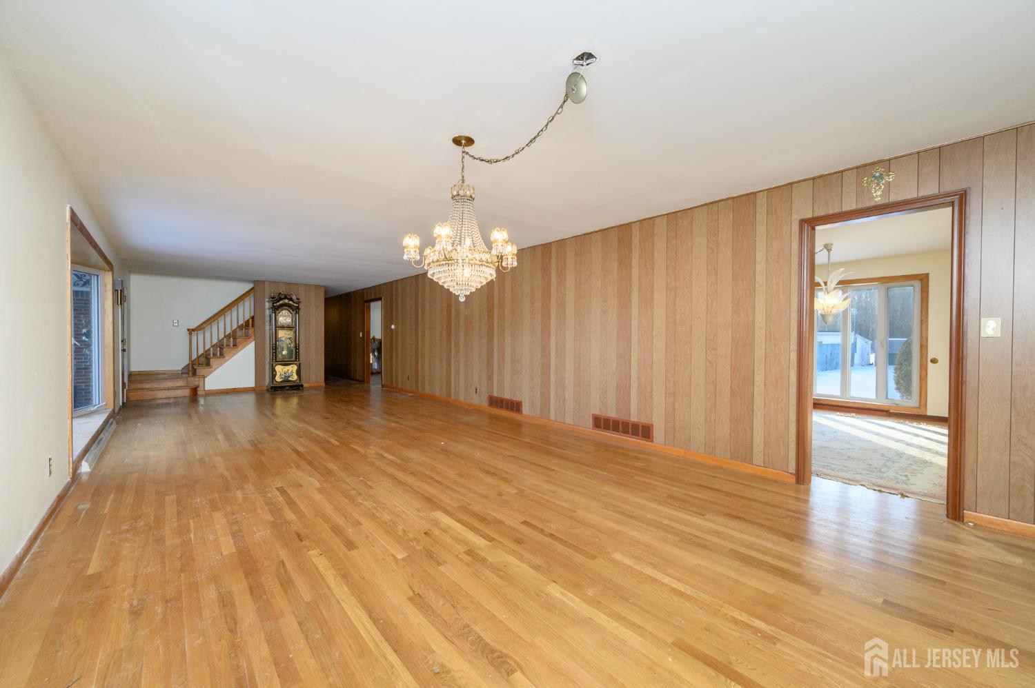 1821 Englishtown Road Old Bridge, NJ 08857 - Photo 6 of 46 a view of empty room with wooden floor