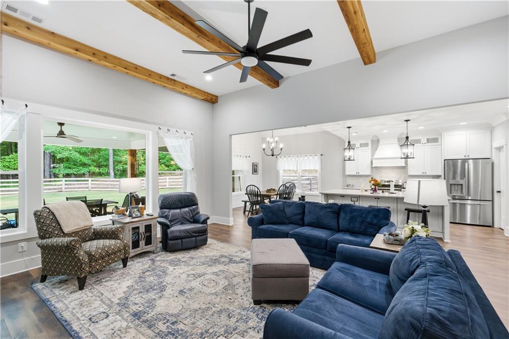 3584 Stock Road Monroe, GA 30656 - Photo 16 of 80 a living room with furniture ceiling fan and a large window