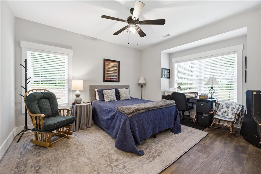 3584 Stock Road Monroe, GA 30656 - Photo 30 of 80 a bedroom with a bed and a couch