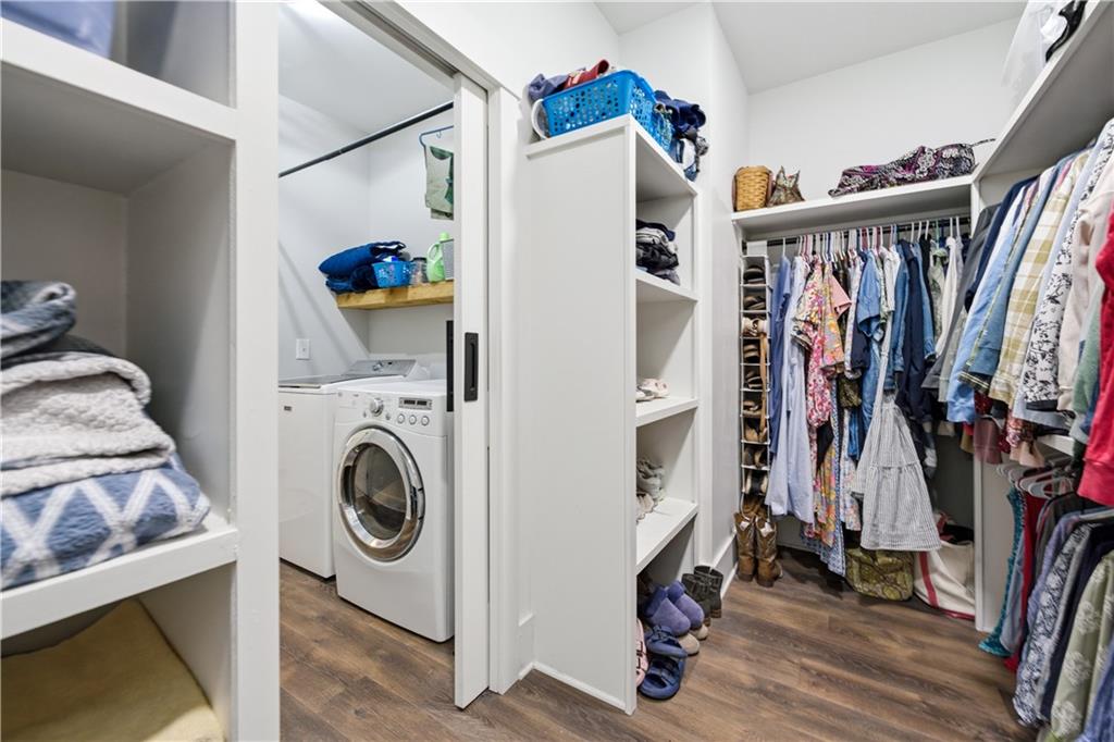 3584 Stock Road Monroe, GA 30656 - Photo 33 of 80 a view of walk in closet with clothes and shoes