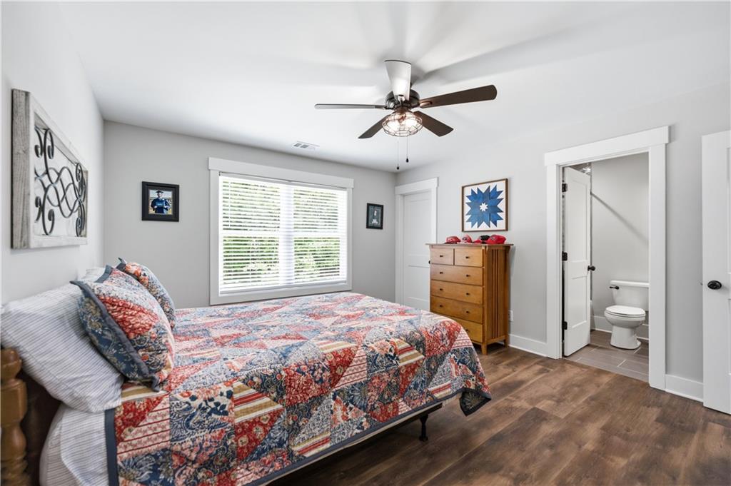 3584 Stock Road Monroe, GA 30656 - Photo 45 of 80 a bedroom with a bed and a window
