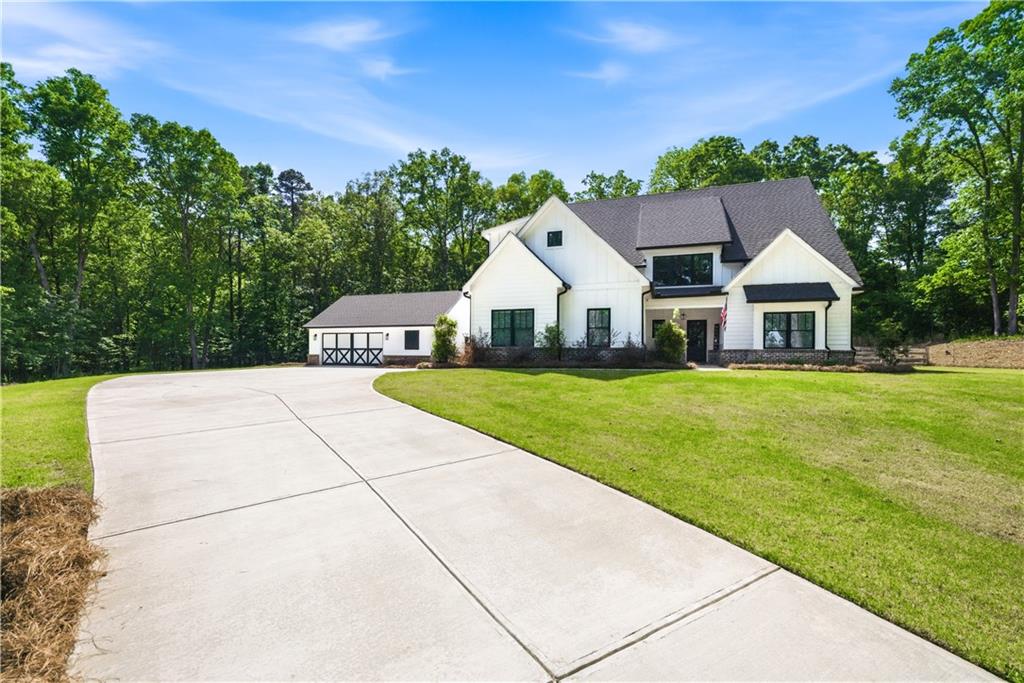 3584 Stock Road Monroe, GA 30656 - Photo 5 of 80 a front view of house with yard and green space