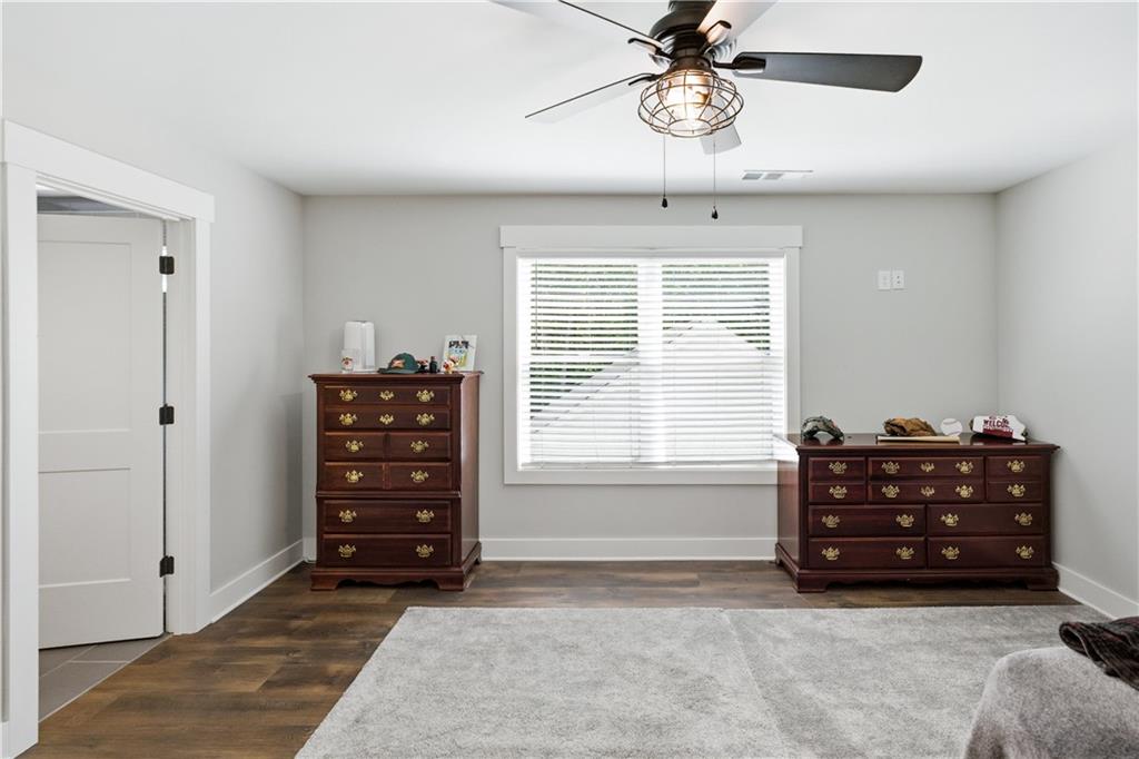 3584 Stock Road Monroe, GA 30656 - Photo 52 of 80 a room with a dresser and a window