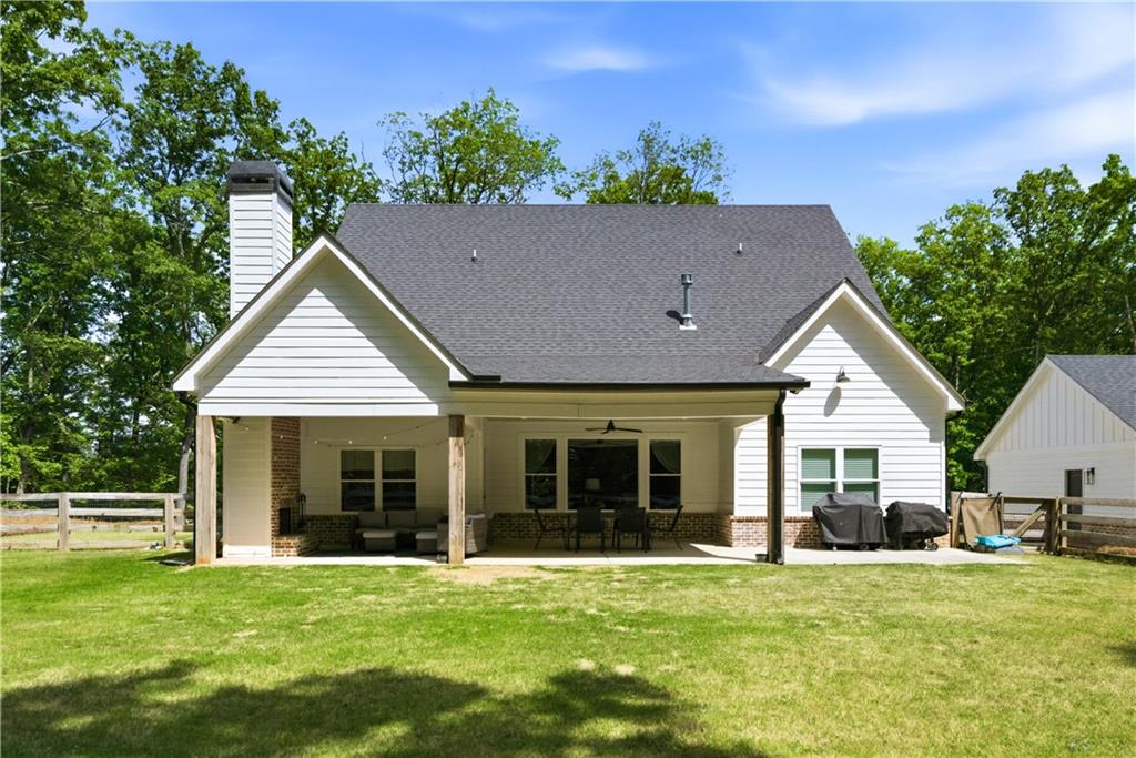 3584 Stock Road Monroe, GA 30656 - Photo 61 of 80 front view of a house with a yard