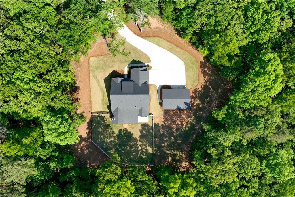 3584 Stock Road Monroe, GA 30656 - Photo 65 of 80 an aerial view of a house with swimming pool and garden
