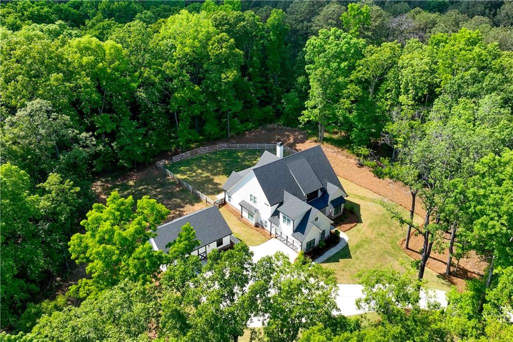 3584 Stock Road Monroe, GA 30656 - Photo 68 of 80 an aerial view of a house with swimming pool and garden