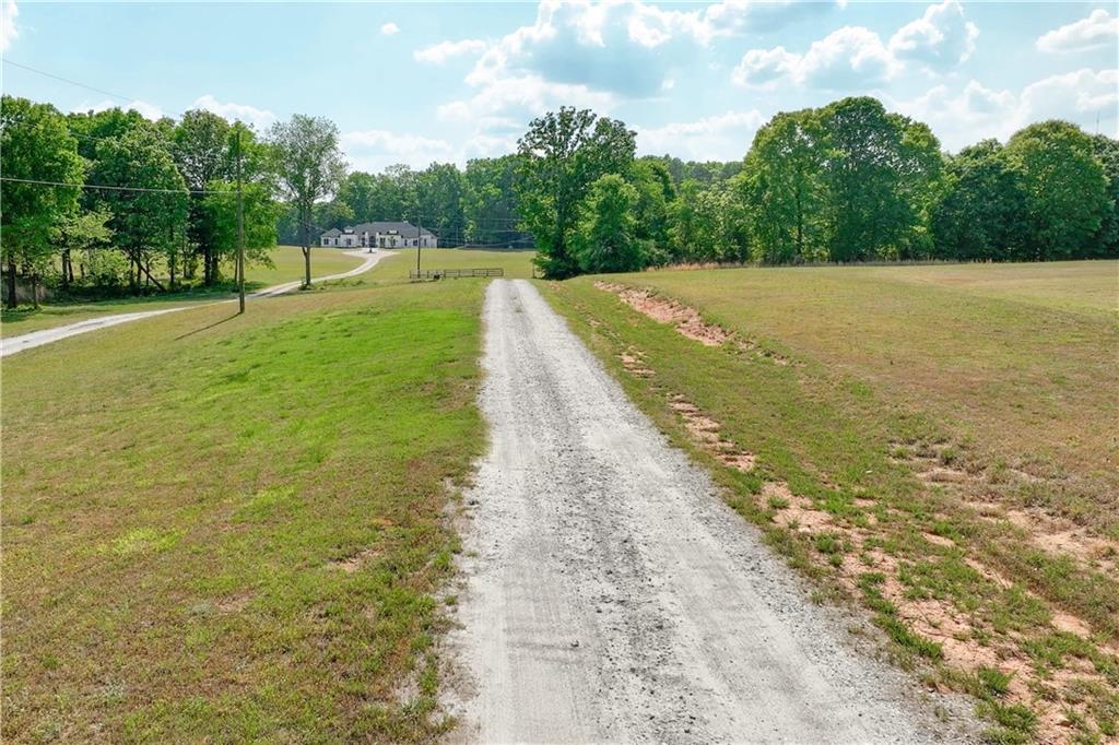3584 Stock Road Monroe, GA 30656 - Photo 74 of 80 a view of a lake with a yard