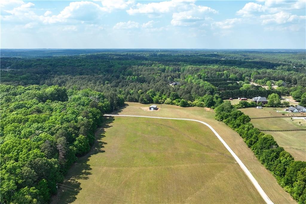 3584 Stock Road Monroe, GA 30656 - Photo 75 of 80 a view of a swimming pool with a yard