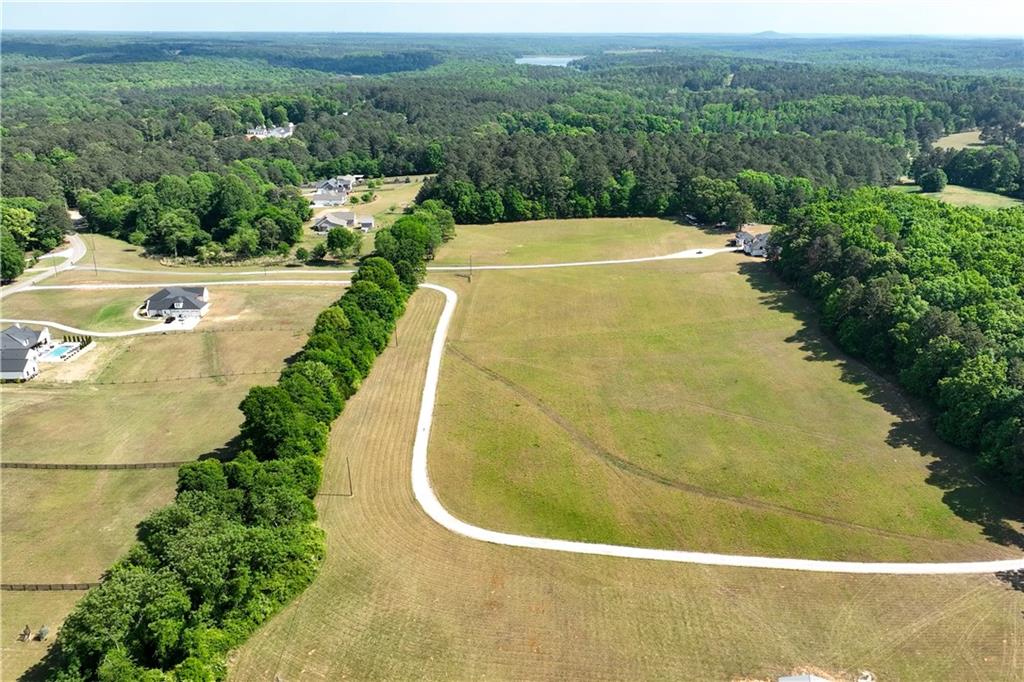 3584 Stock Road Monroe, GA 30656 - Photo 76 of 80 a view of a swimming pool with a yard