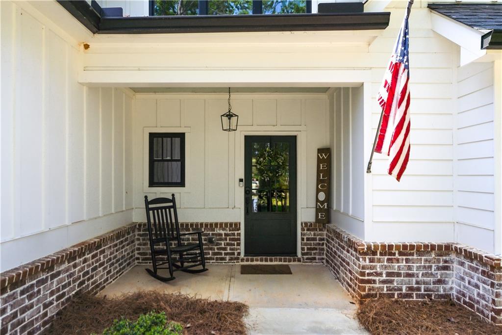 3584 Stock Road Monroe, GA 30656 - Photo 10 of 80 a front view of a house with glass windows