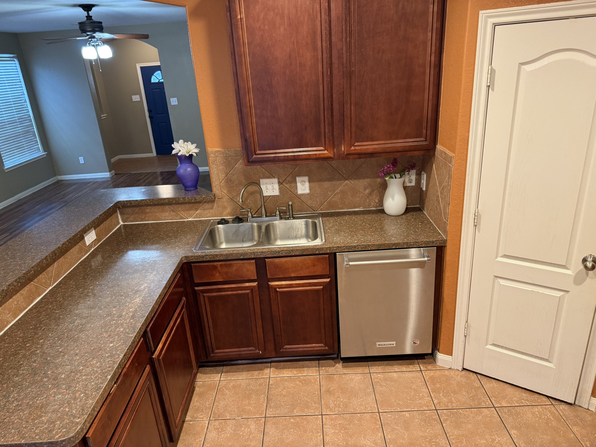 9429 Lambright Road Houston, TX 77075 - Photo 11 of 40 Enjoy a direct view to the front door from your kitchen sink!