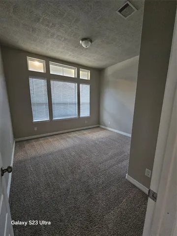 a bathroom with a sink a toilet and bathtub