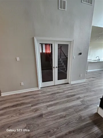 a view of a livingroom with wooden floor