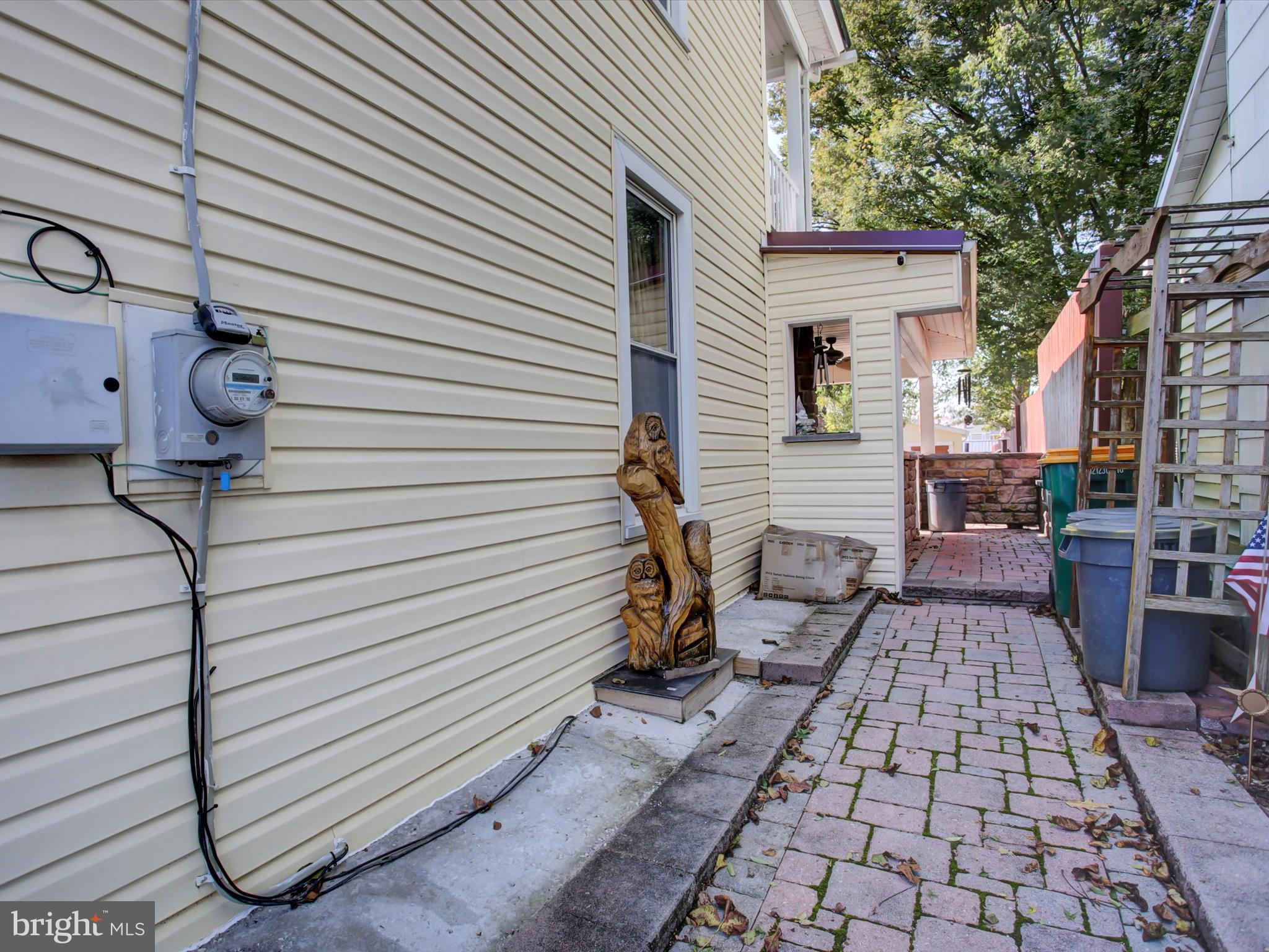 208 Hamilton Avenue Waynesboro, PA 17268 - Photo 37 of 54 Walkway to rear yard w/ gate to enter deck