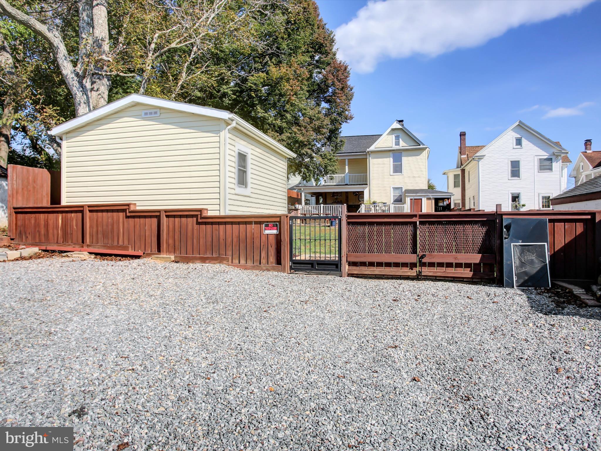 208 Hamilton Avenue Waynesboro, PA 17268 - Photo 54 of 54 Rear parking on outside of property shows gates