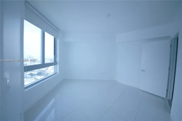 an empty room with a window