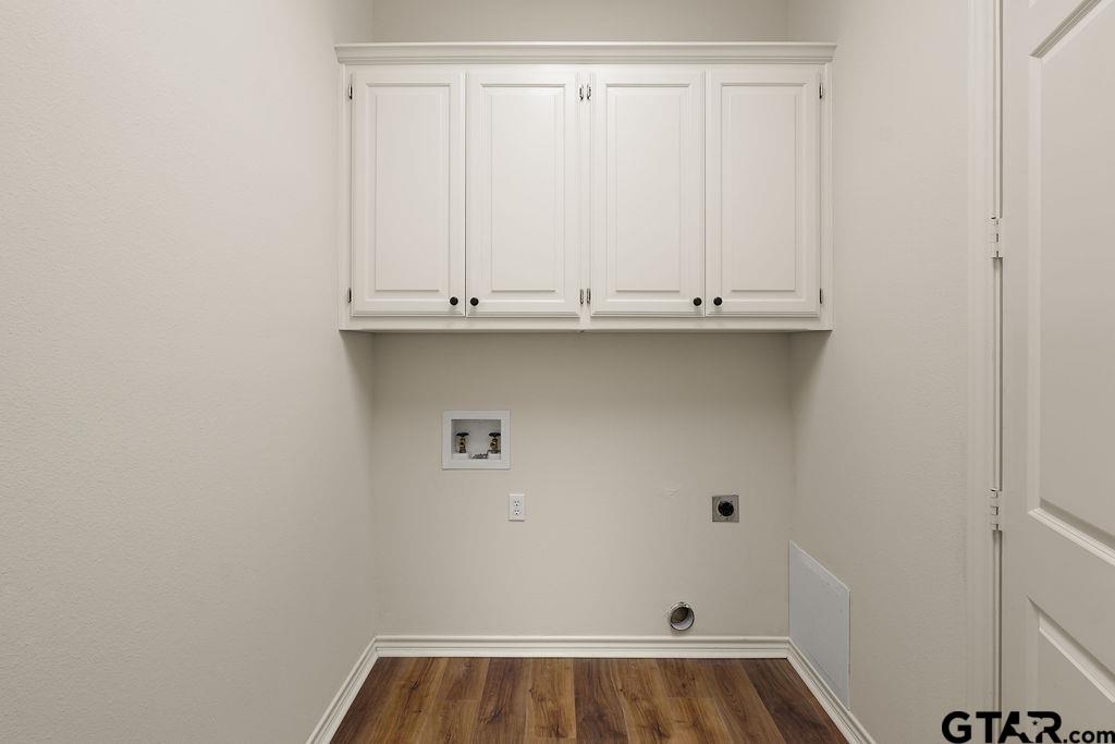 2210 Homestead Lane Tyler, TX 75701 - Photo 13 of 26 a view of storage and utility room with wooden floor