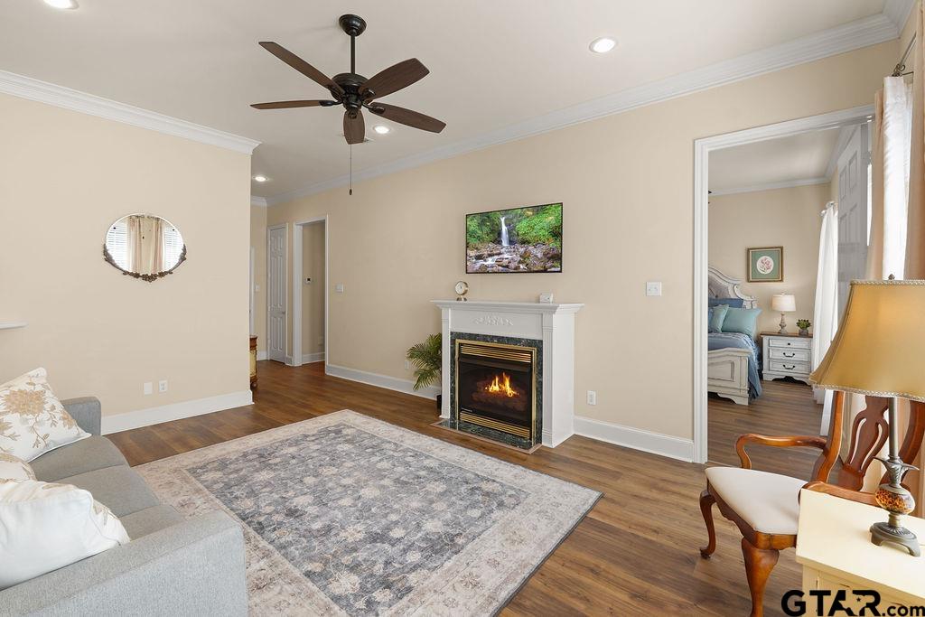 2210 Homestead Lane Tyler, TX 75701 - Photo 6 of 26 a living room with furniture and a fireplace
