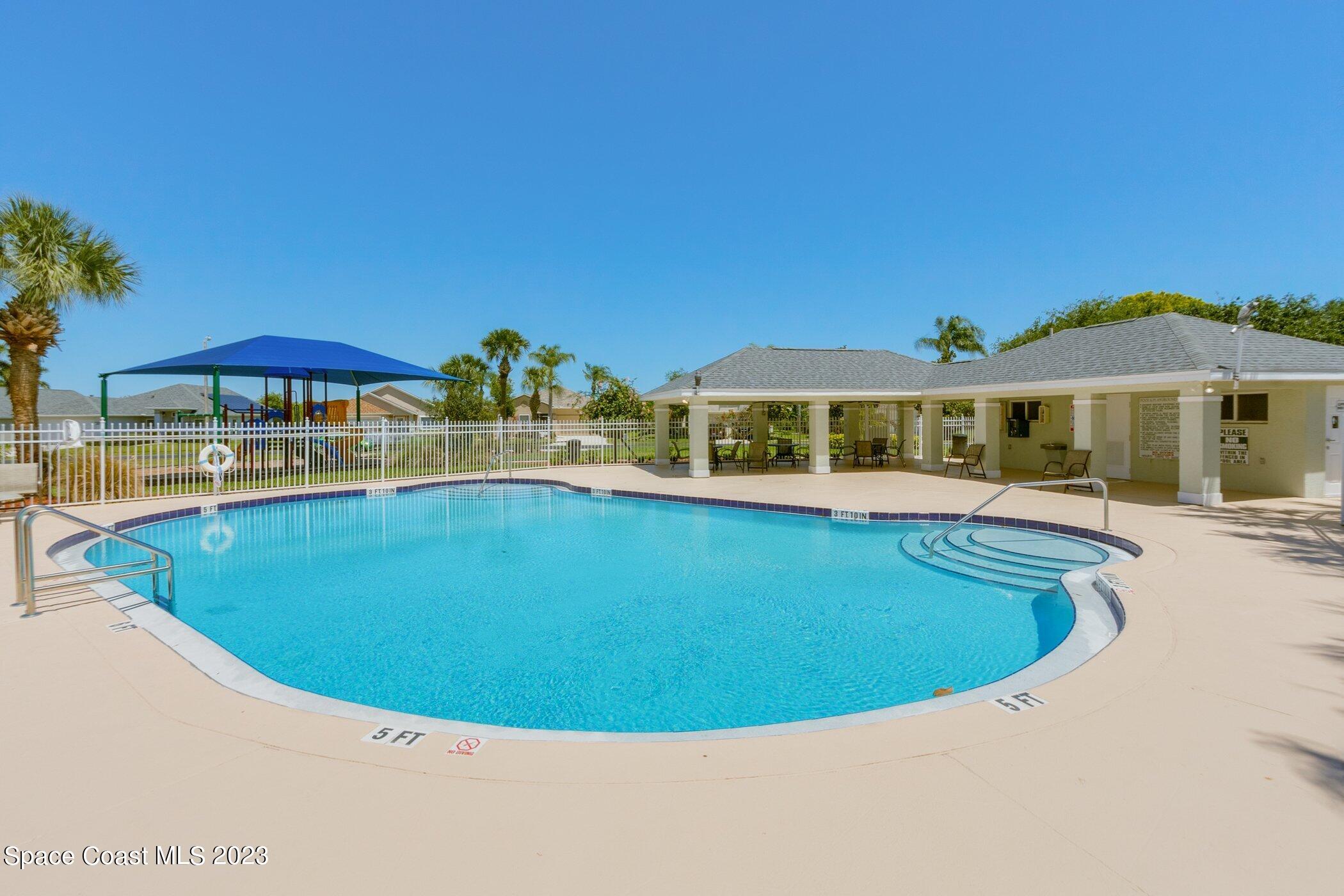 3390 Deer Lakes Drive Melbourne, FL 32940 - Photo 24 of 28 Community Pool View 1