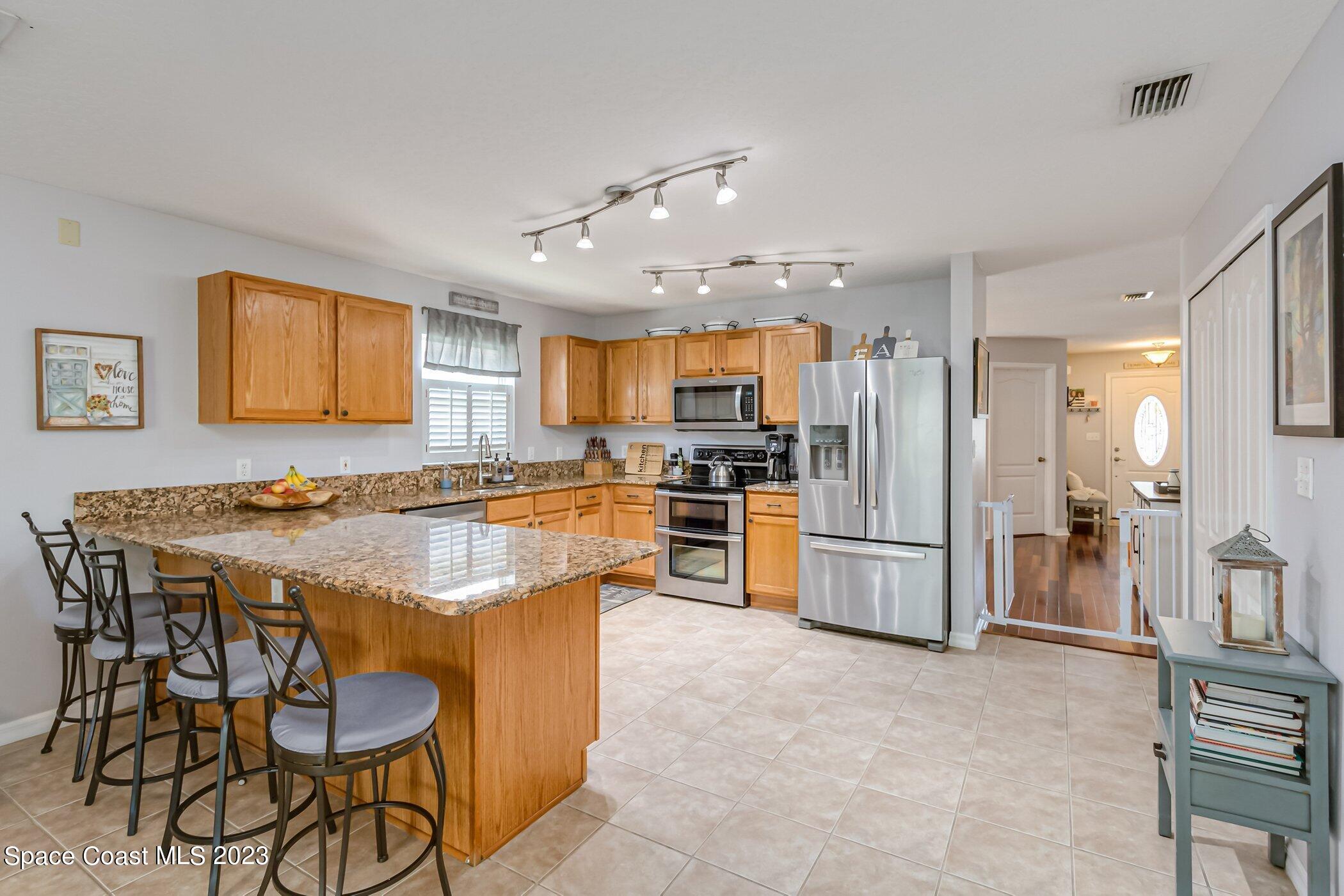 3390 Deer Lakes Drive Melbourne, FL 32940 - Photo 6 of 28 Kitchen 2
