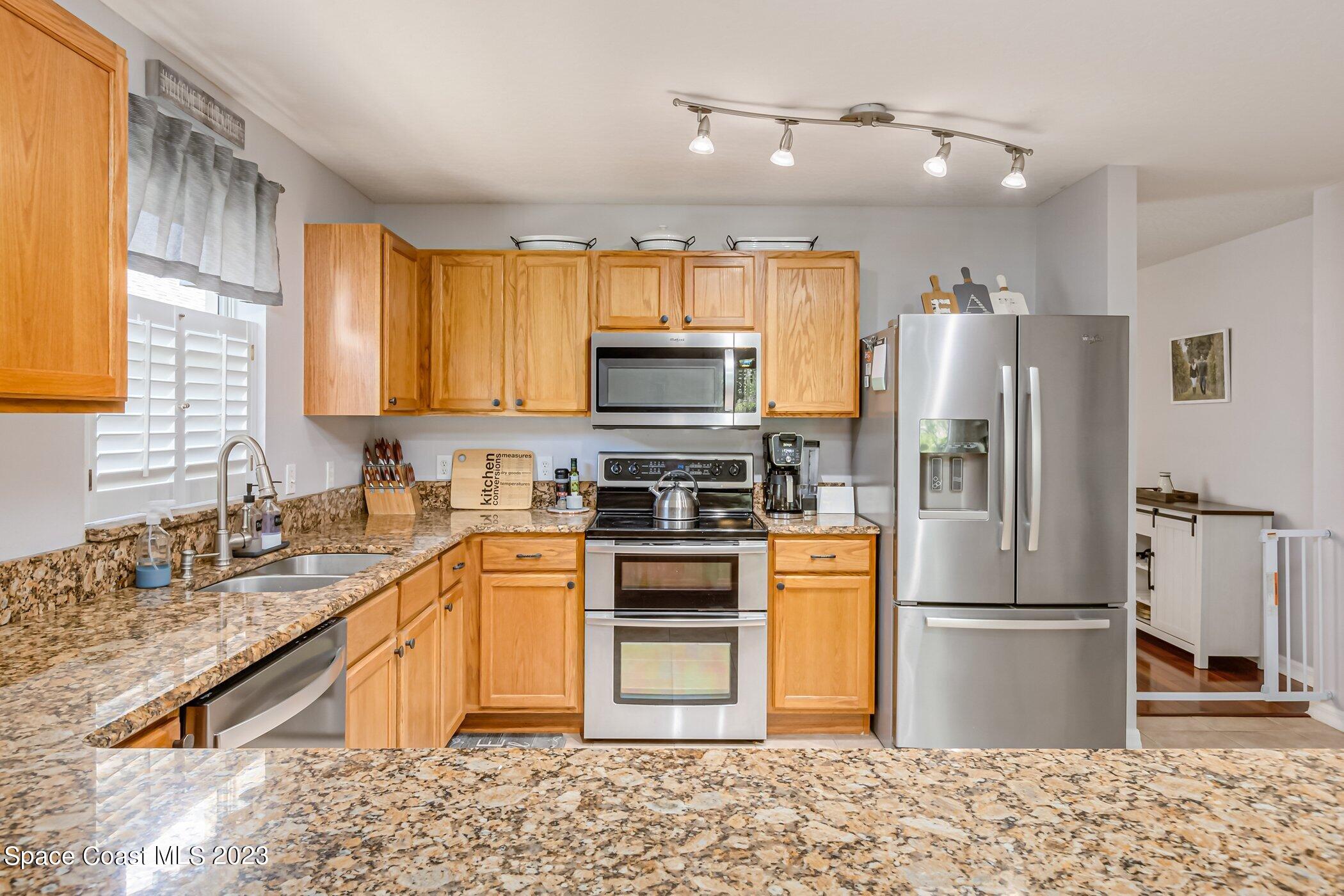 3390 Deer Lakes Drive Melbourne, FL 32940 - Photo 7 of 28 Kitchen 3