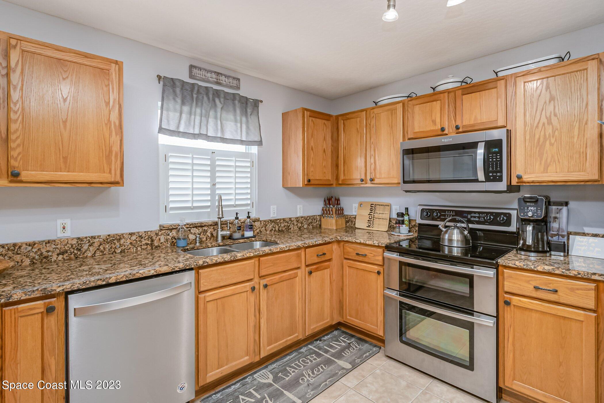 3390 Deer Lakes Drive Melbourne, FL 32940 - Photo 8 of 28 Kitchen 4