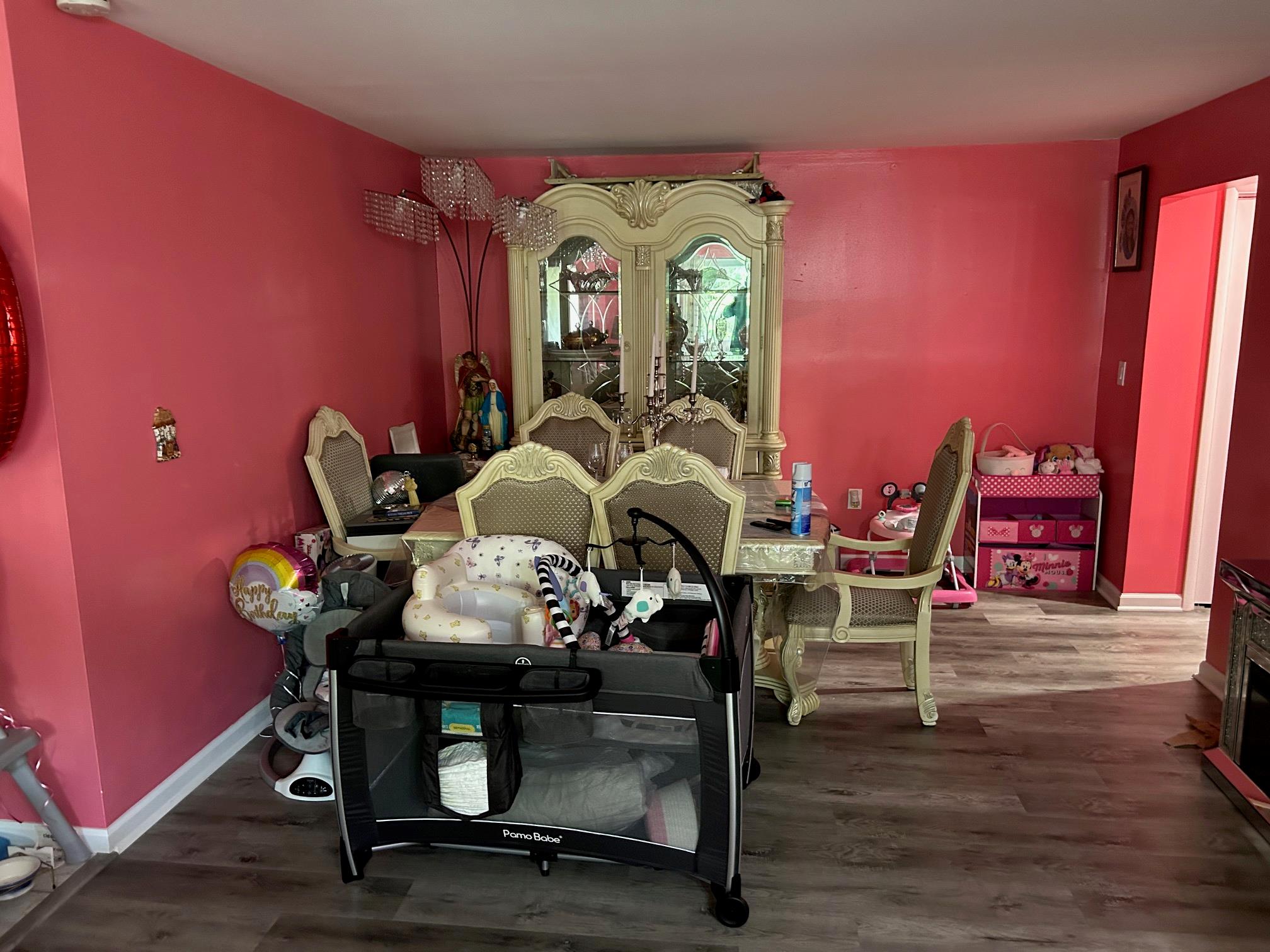 2 Secora Road, Unit C20 Monsey, NY 10952 - Photo 13 of 34 a view of a dining room with furniture and wooden floor