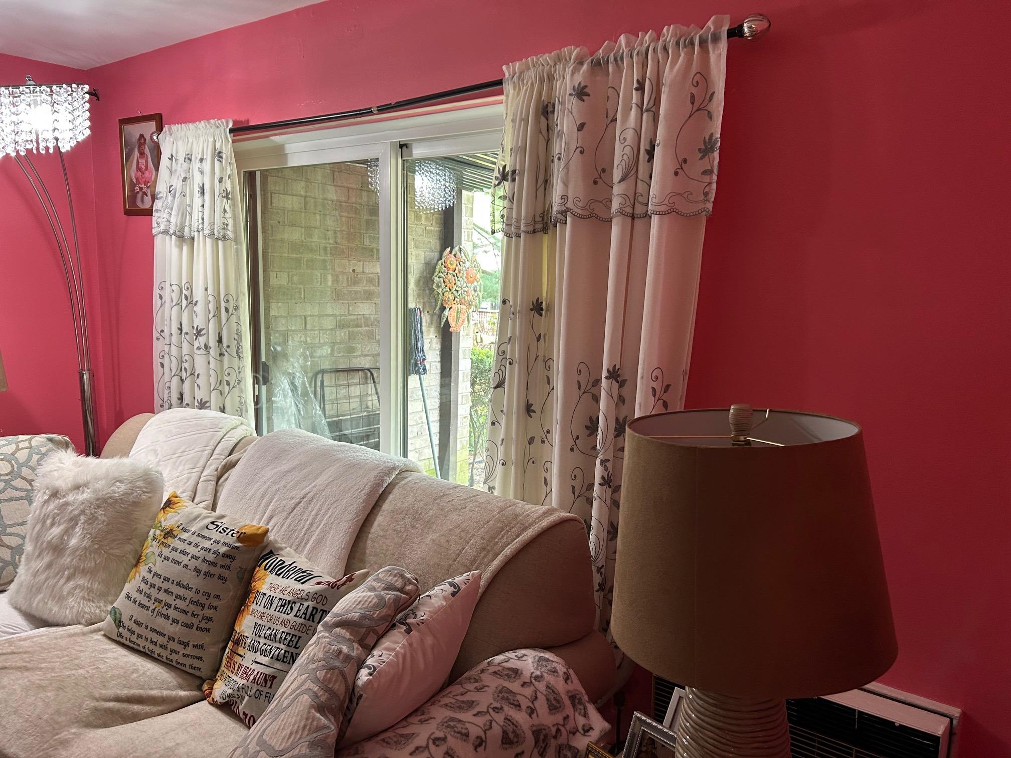 2 Secora Road, Unit C20 Monsey, NY 10952 - Photo 14 of 34 a bed sitting in a bedroom next to a window