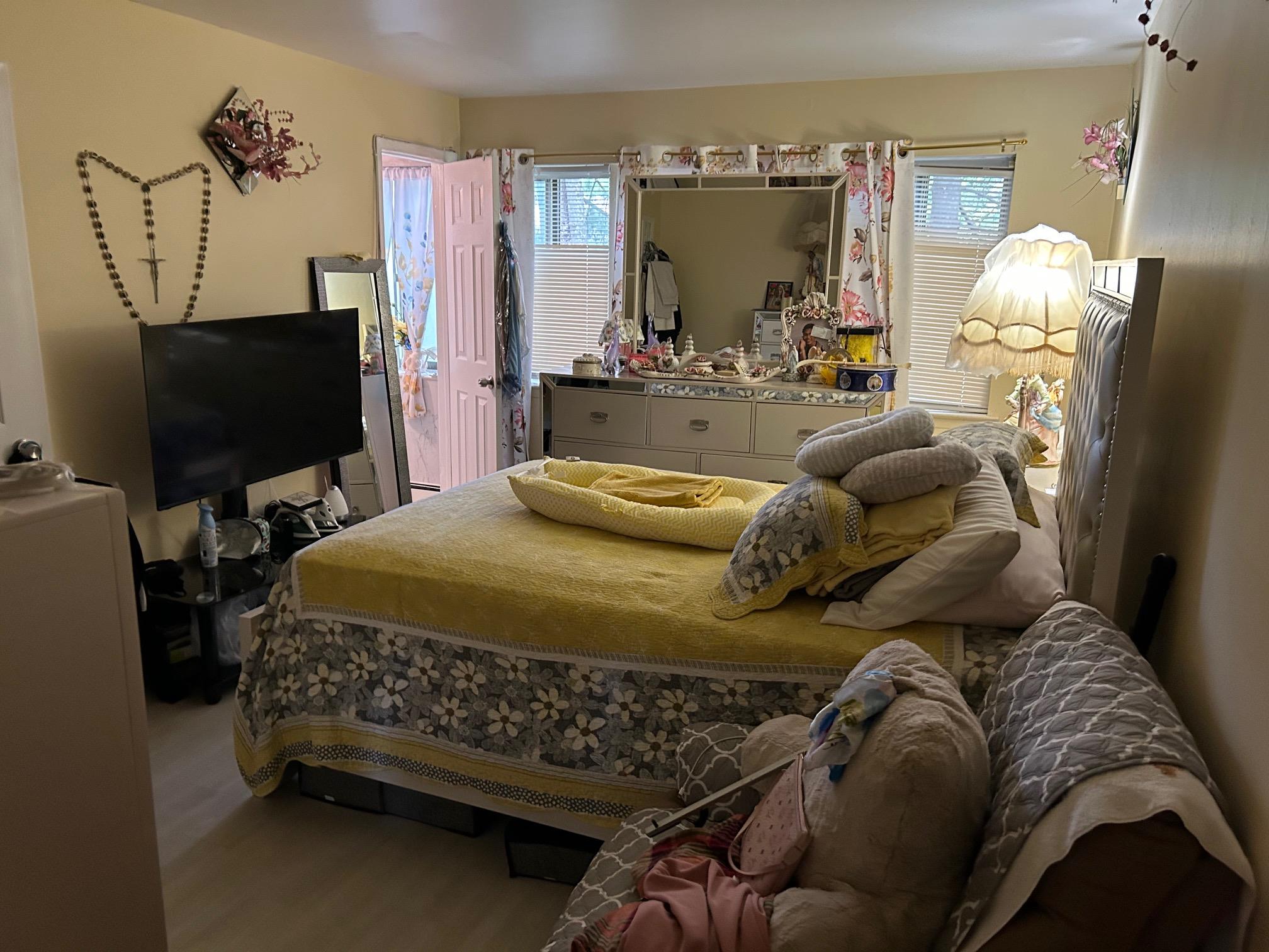 2 Secora Road, Unit C20 Monsey, NY 10952 - Photo 19 of 34 a bedroom with a bed and tv