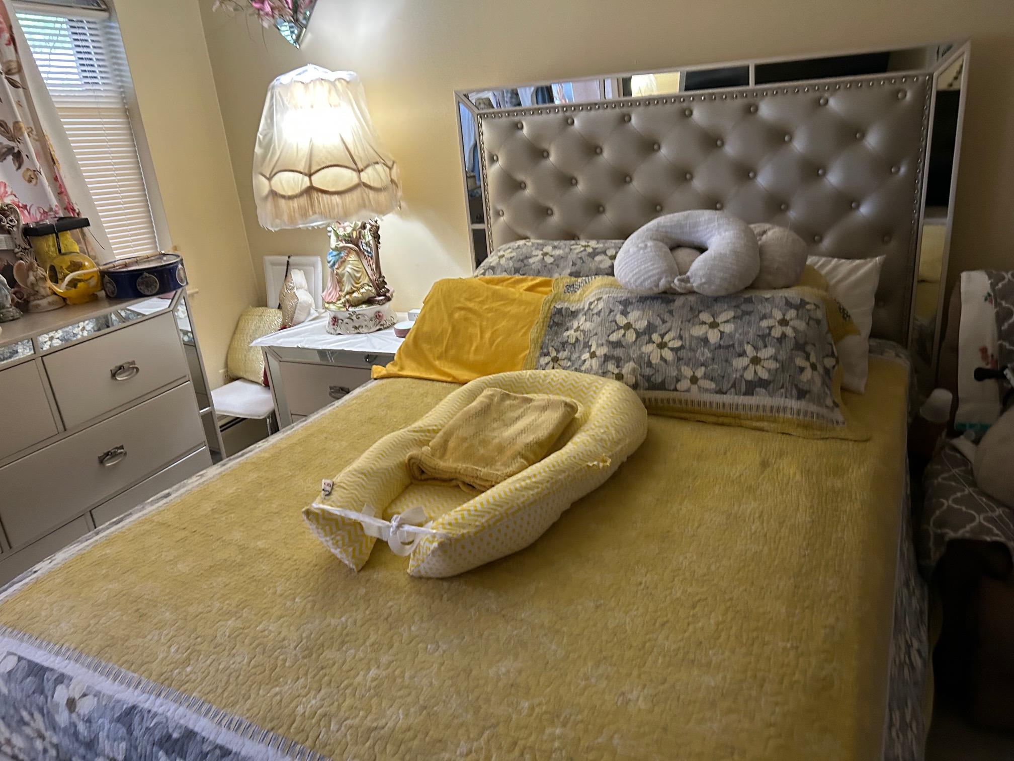 2 Secora Road, Unit C20 Monsey, NY 10952 - Photo 20 of 34 a bedroom with a bed and a mirror on the dresser