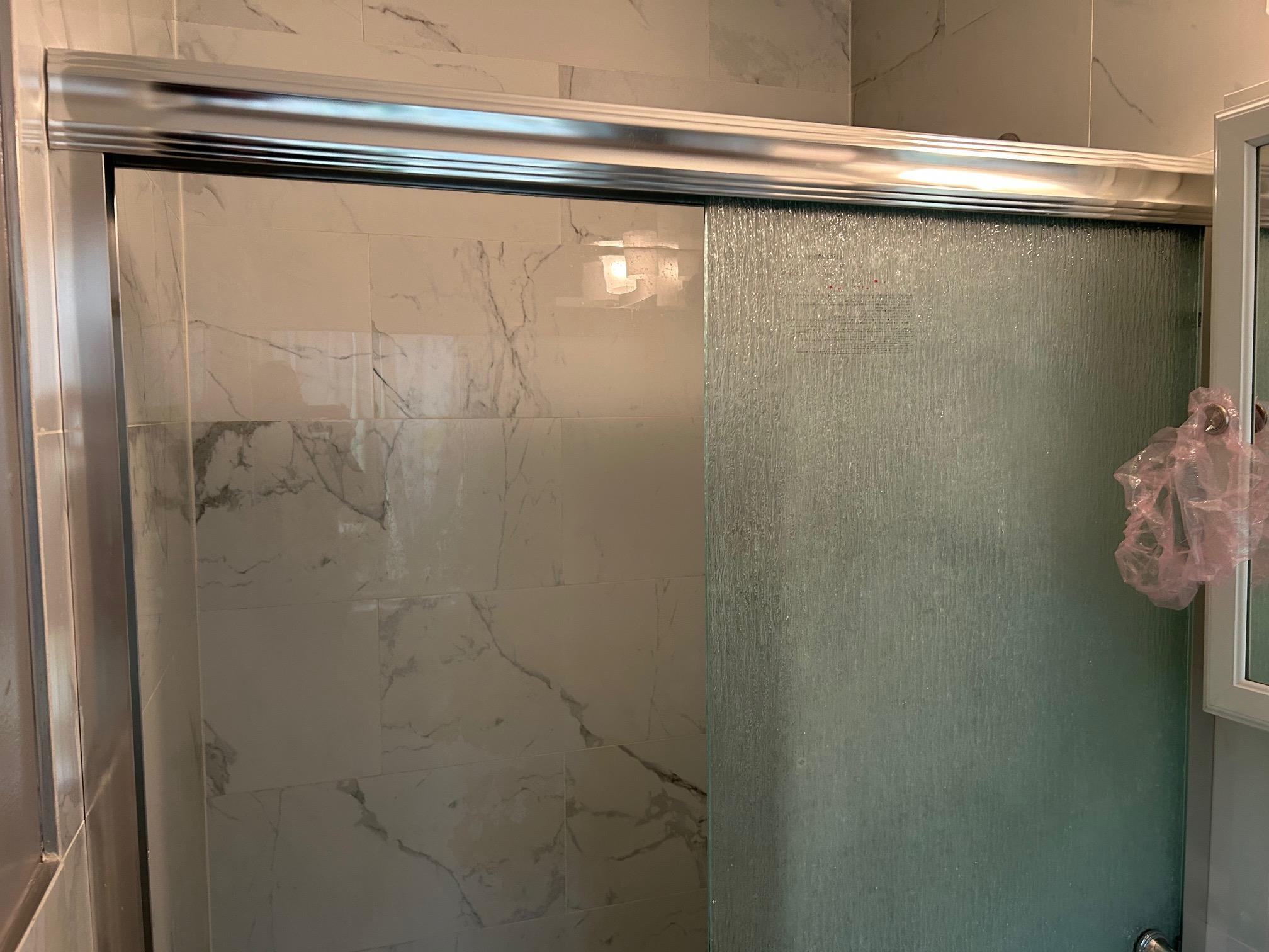 2 Secora Road, Unit C20 Monsey, NY 10952 - Photo 21 of 34 a close view of a shower in a bathroom