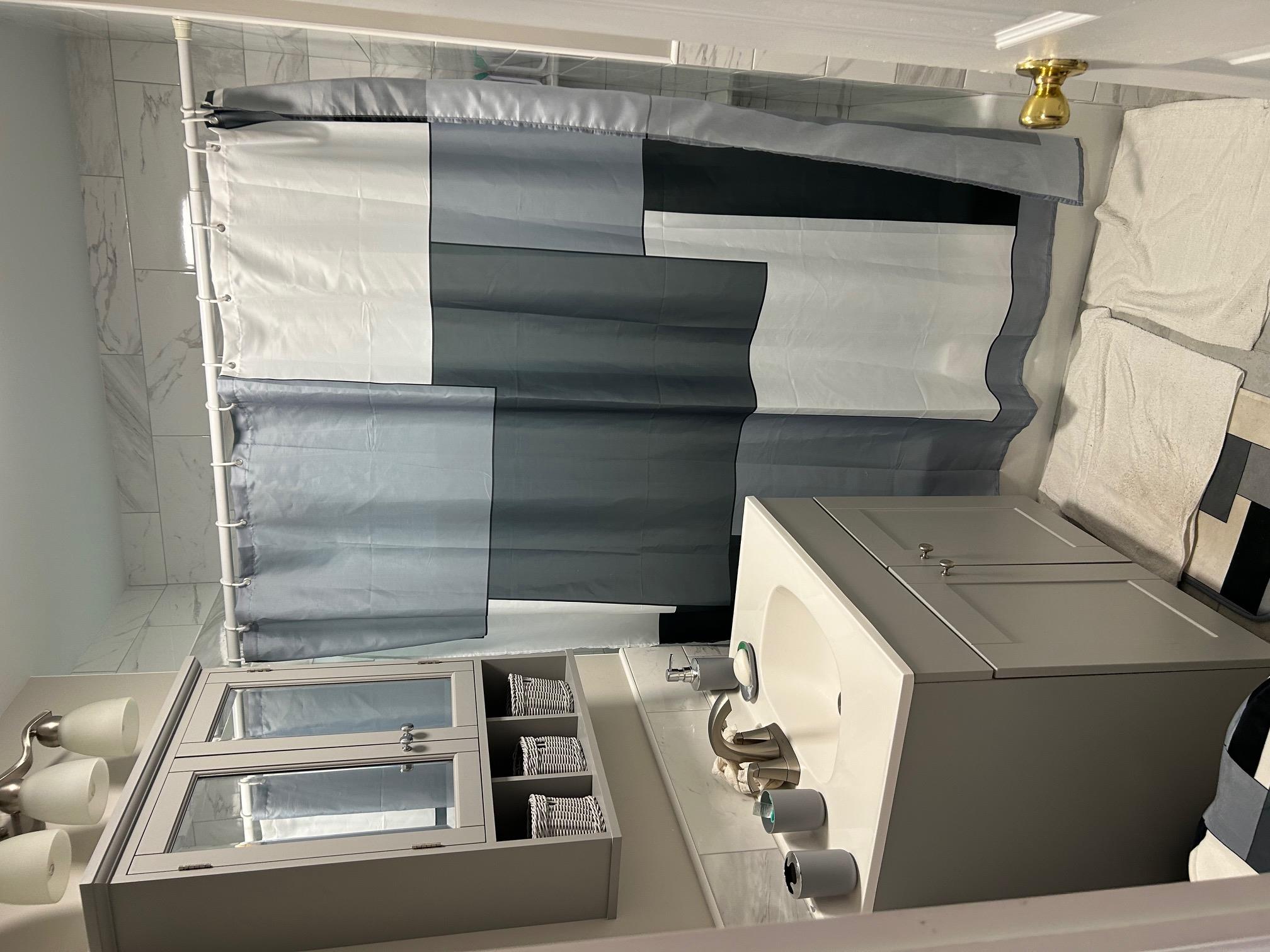 2 Secora Road, Unit C20 Monsey, NY 10952 - Photo 28 of 34 a bathroom with a sink and a mirror