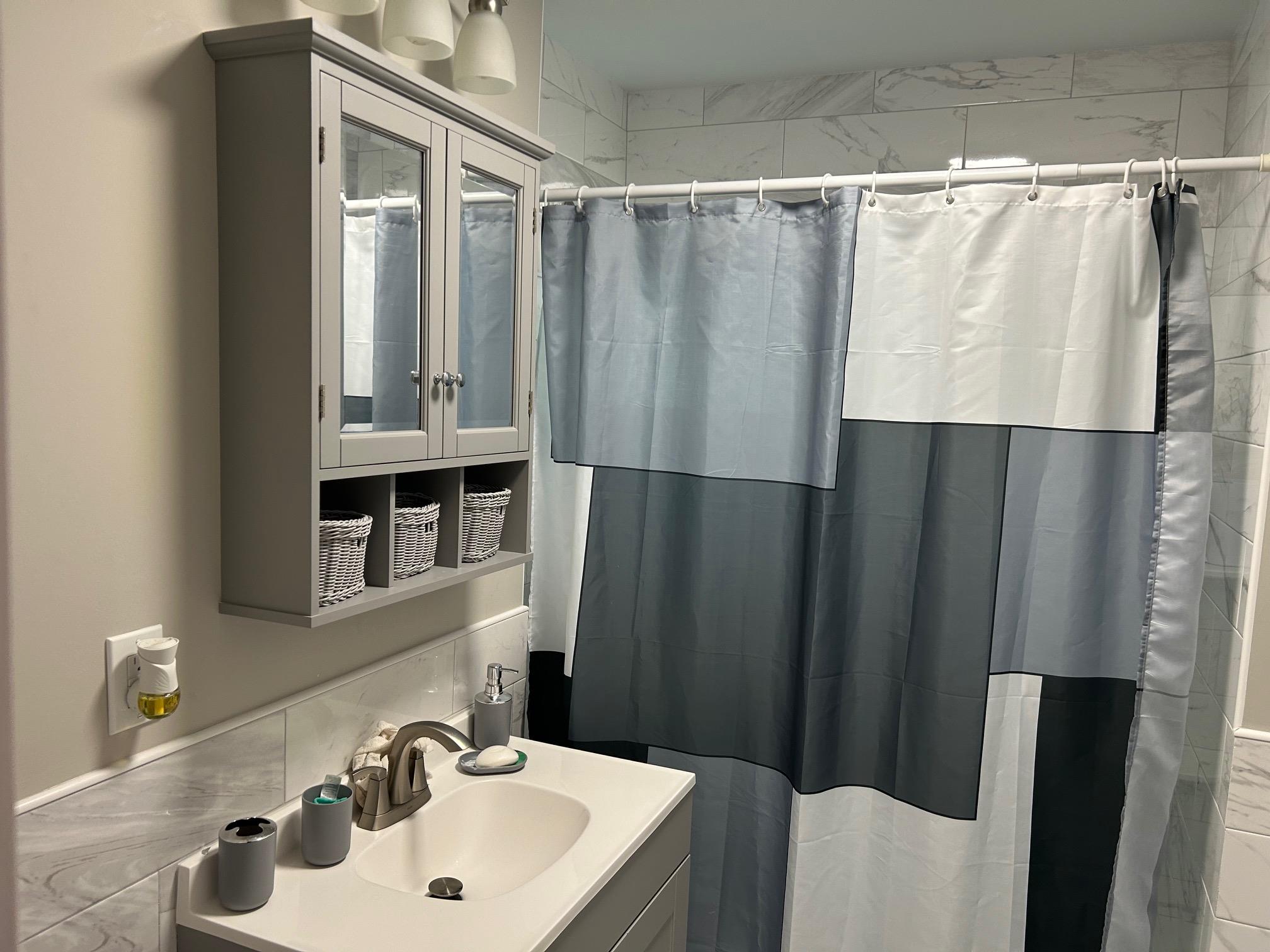 2 Secora Road, Unit C20 Monsey, NY 10952 - Photo 32 of 34 a bathroom with a sink and a mirror