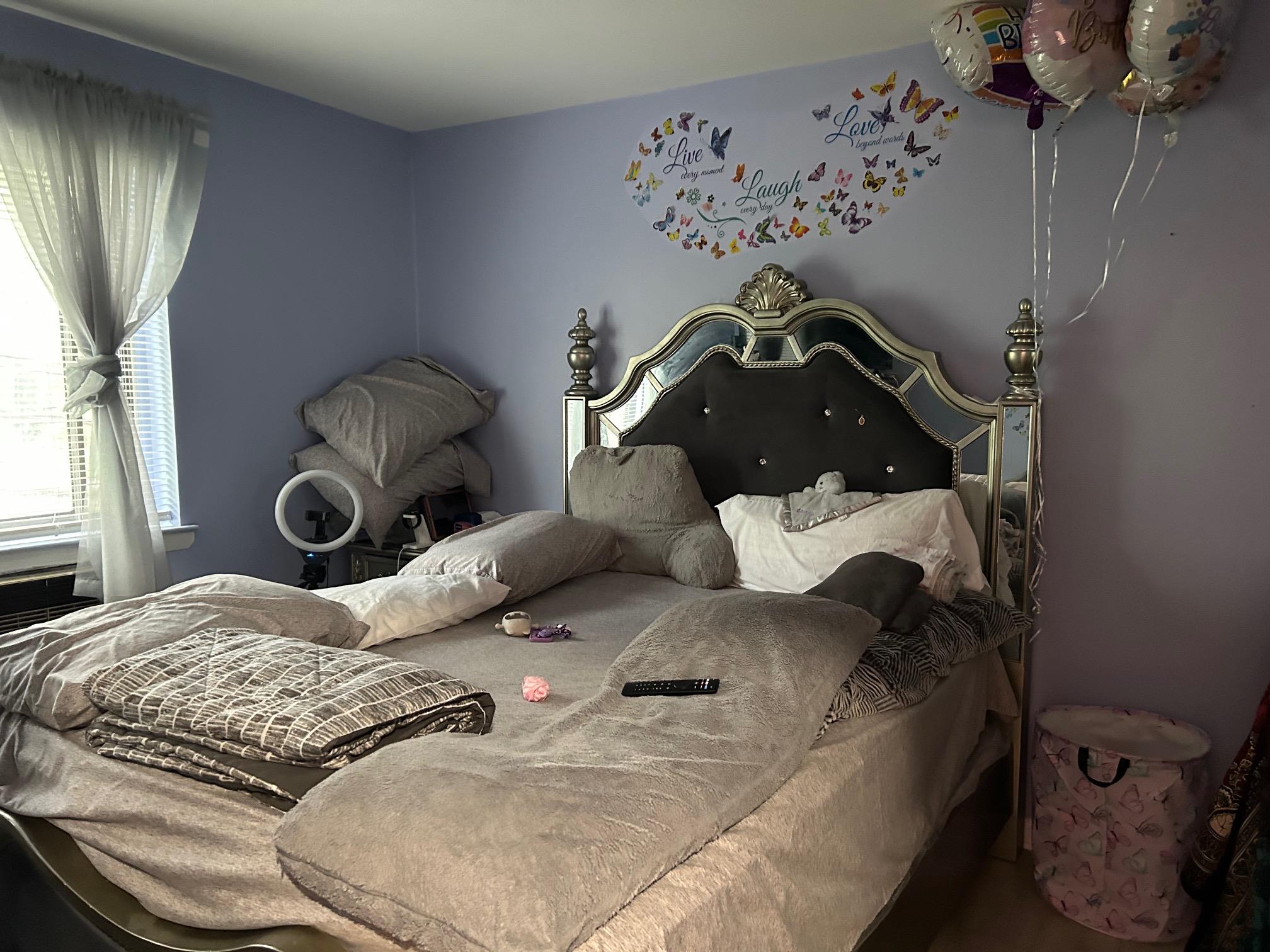 2 Secora Road, Unit C20 Monsey, NY 10952 - Photo 33 of 34 a bedroom with a bed and dresser with mirror