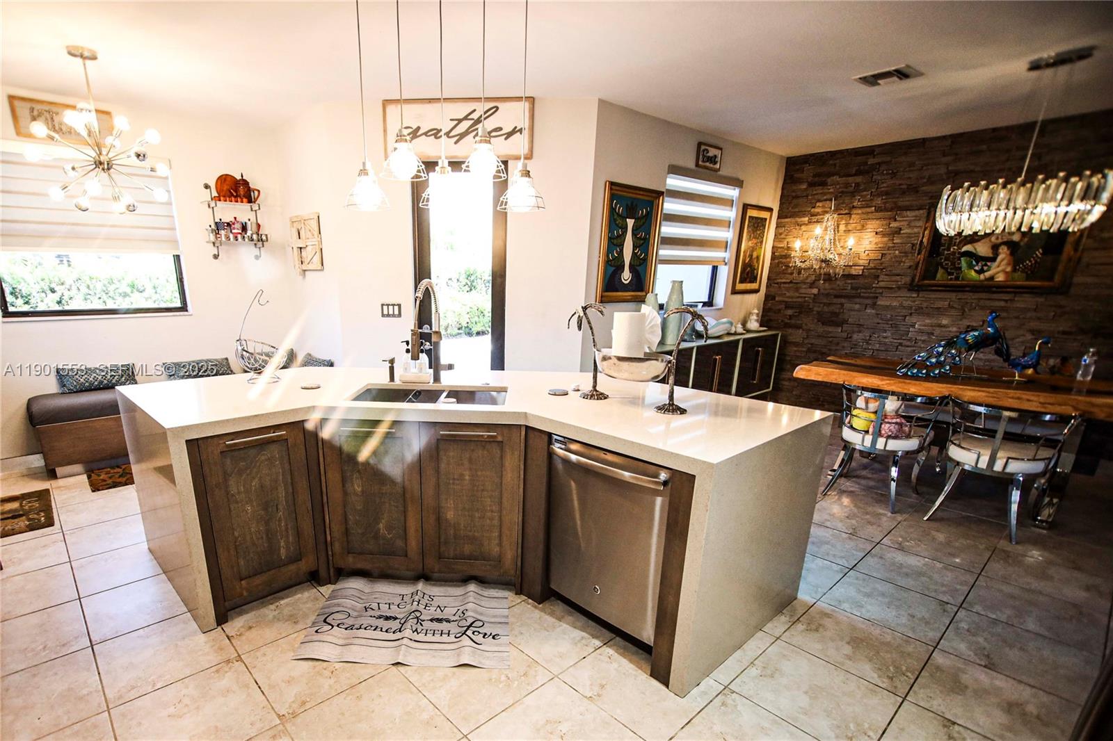 11863 Southwest 233rd Terrace Homestead, FL 33032 - Photo 21 of 77 a kitchen with a sink and a stove top oven